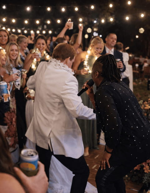 crowd dancing while singer engages with crowd